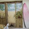 Beach doorway with surfboard, El Cajon, California